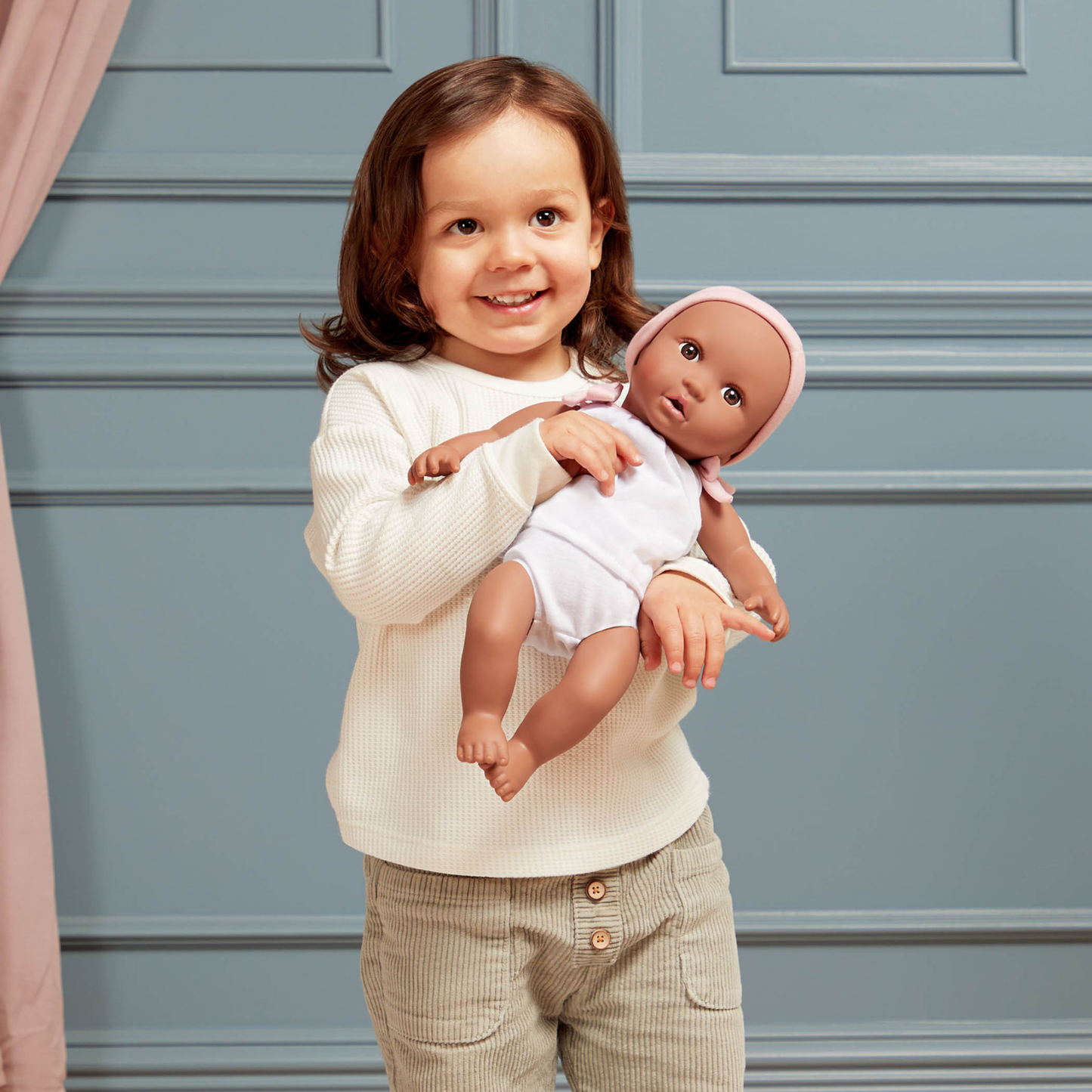 Muñeca bebé con vincha rosa y lazos rosas - modelo #3 Lullababy