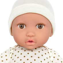 Muñeco bebé con gorro crema y ojos marrones - modelo #1 nuevo