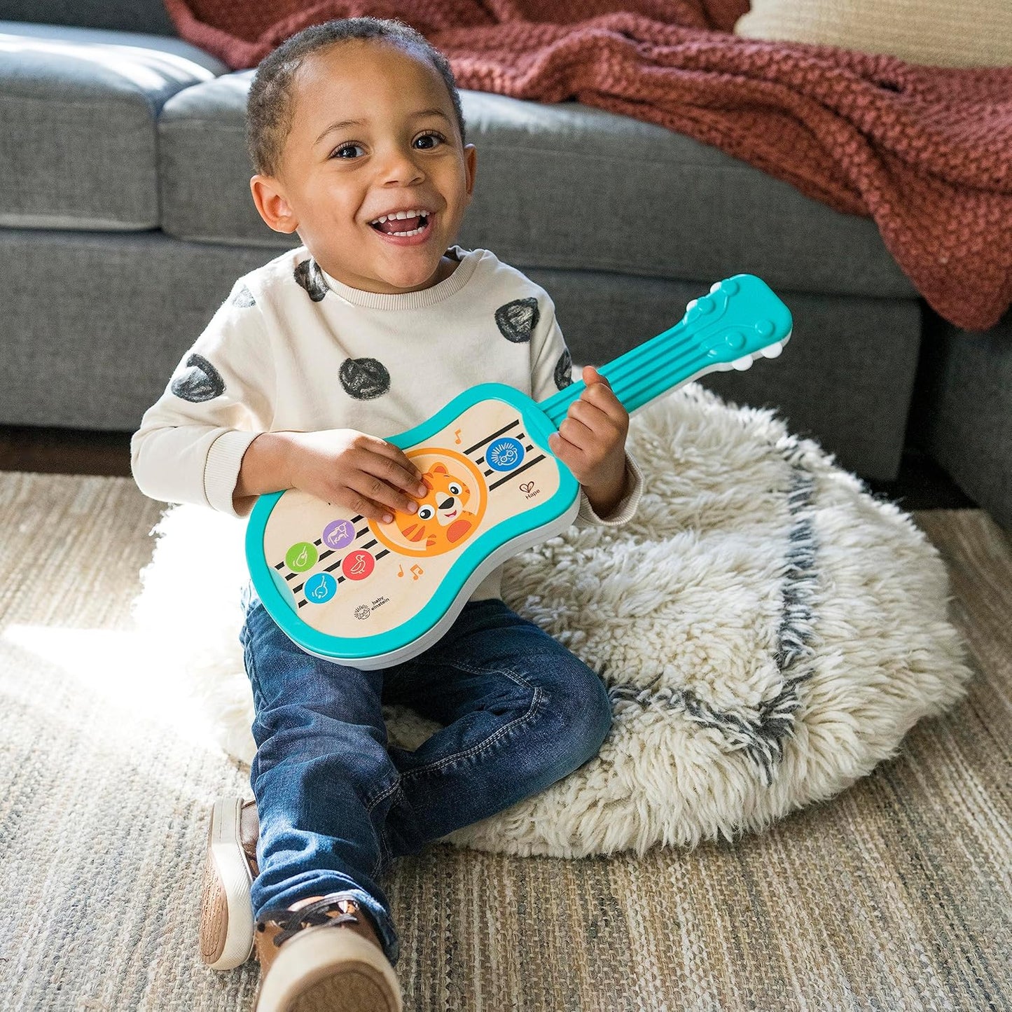 Ukelele de madera interactivo con sonido magic touch Play Essentials